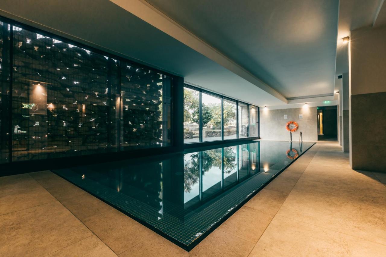 Quarto Panorâmico com piscina interior aquecida