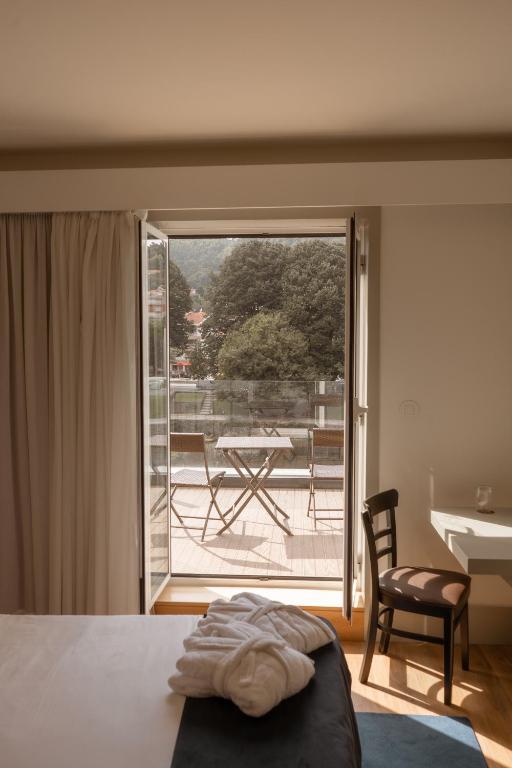 Quarto Panorâmico com piscina interior aquecida